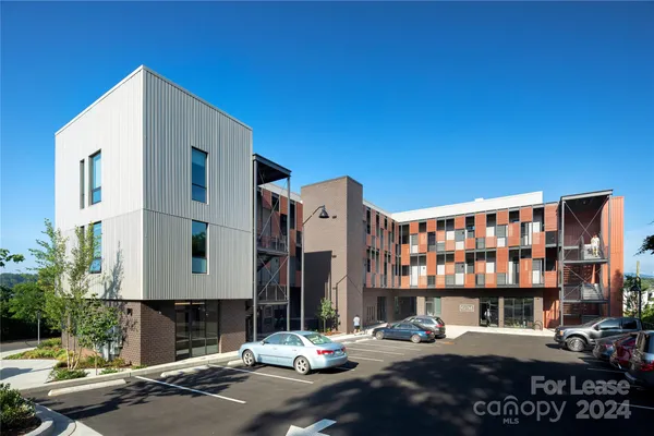 a front view of a building with street view