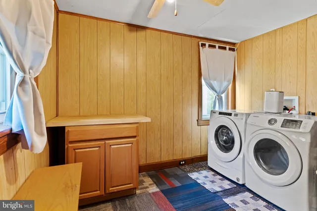 a utility room with dryer and washer