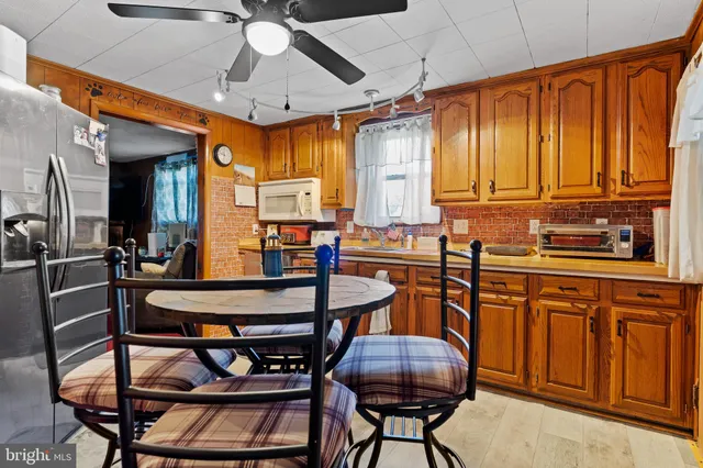 a table and chairs in a kitchen