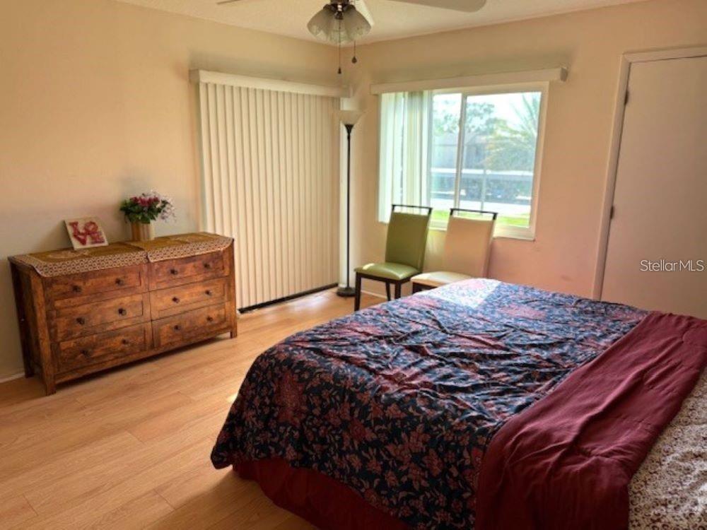 108 Nina Way, Unit 3 Oldsmar, FL 34677 - Photo 13 of 25 a bedroom with a bed and a window