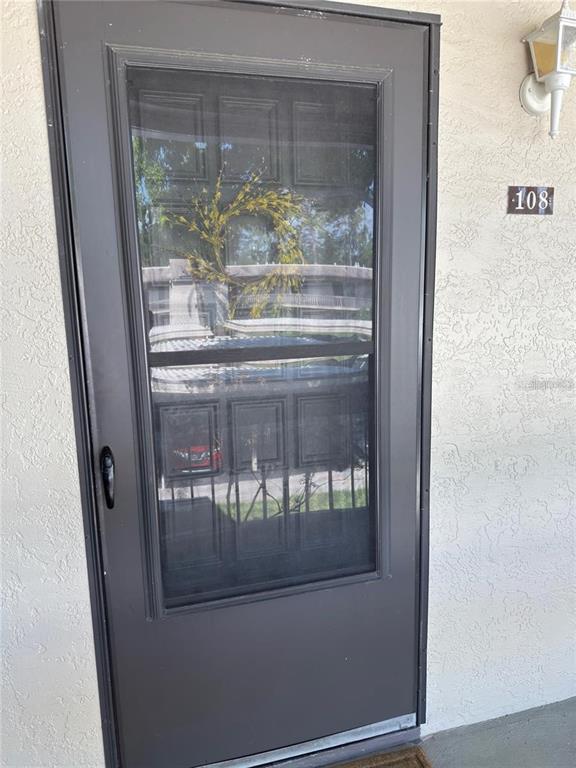 108 Nina Way, Unit 3 Oldsmar, FL 34677 - Photo 3 of 25 a view of a glass door