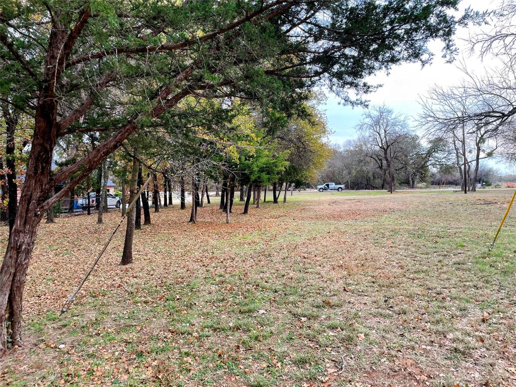3101 Collins Road Burleson, TX 76028 - Photo 5 of 10 a view of road with trees
