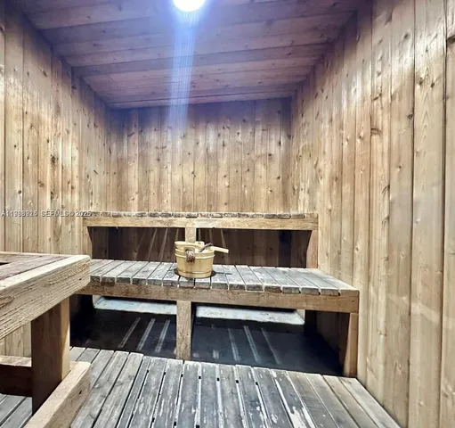 a view of a bike storage with racks on the wall