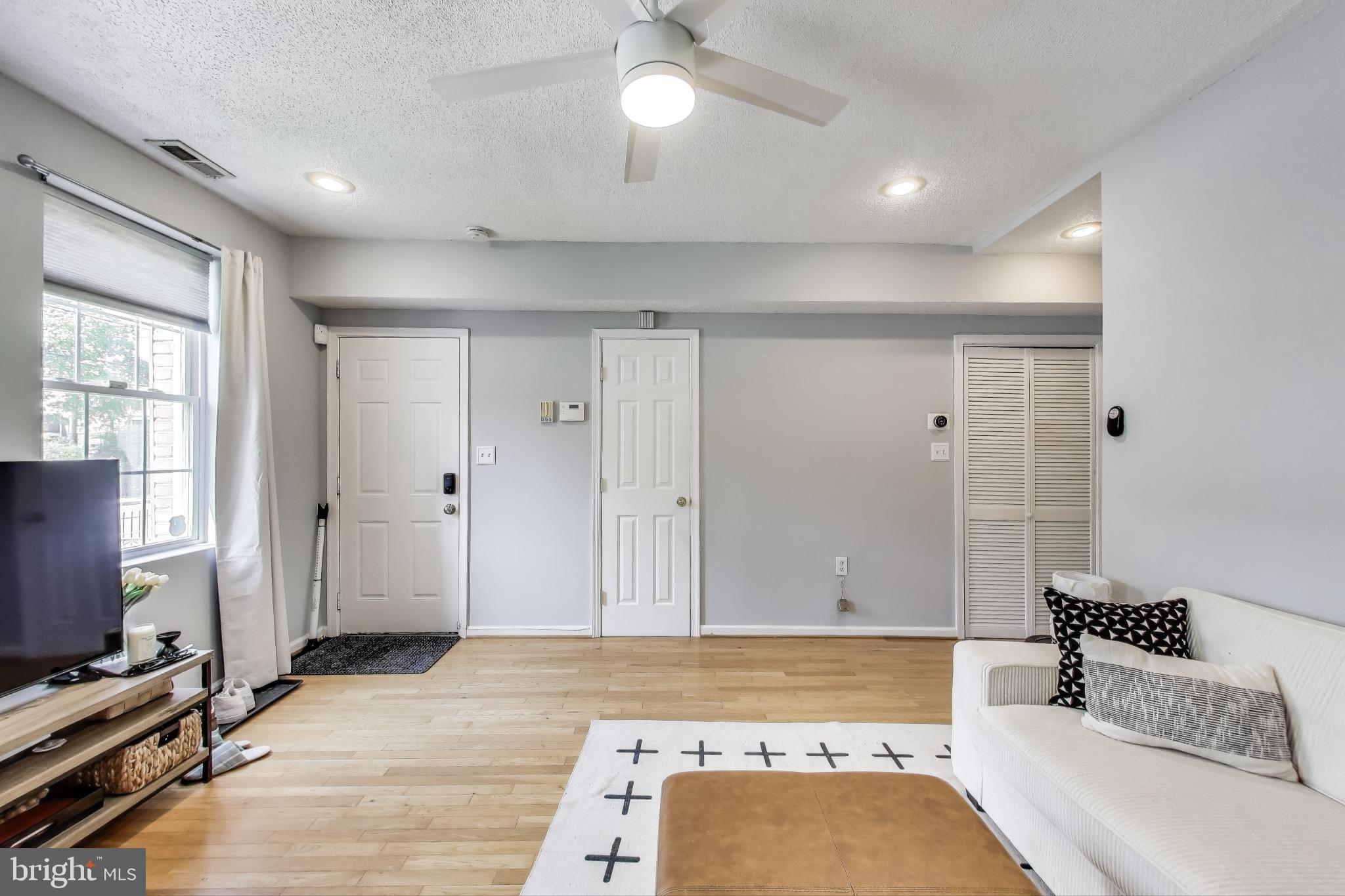 2817 7th Street Northeast, Unit 2 Washington, DC 20017 - Photo 4 of 16 LR Entry to Unit Closet and Laundry