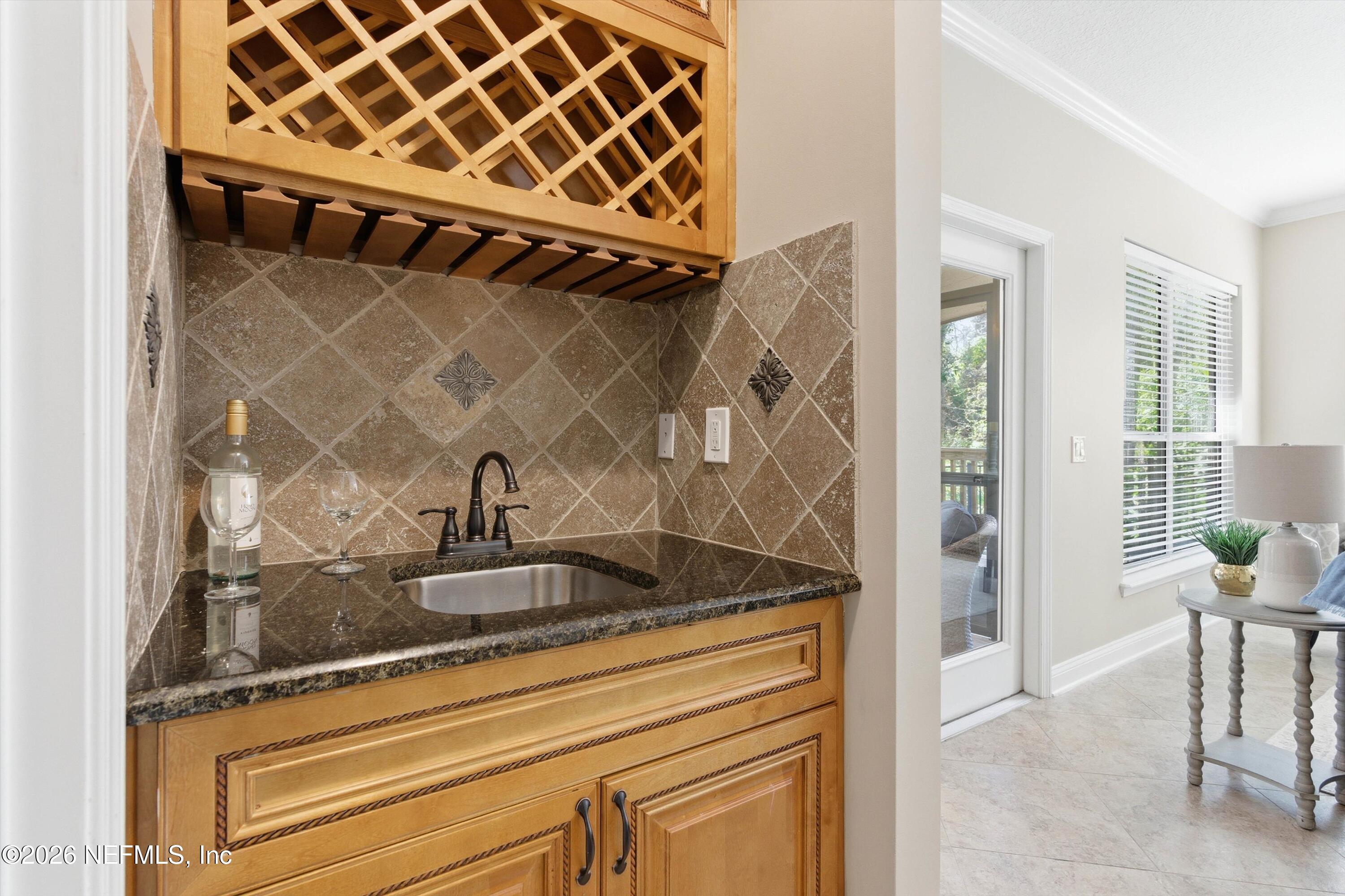 1733 Sanctuary Way Fleming Island, FL 32003 - Photo 12 of 39 a view of a sink and a mirror