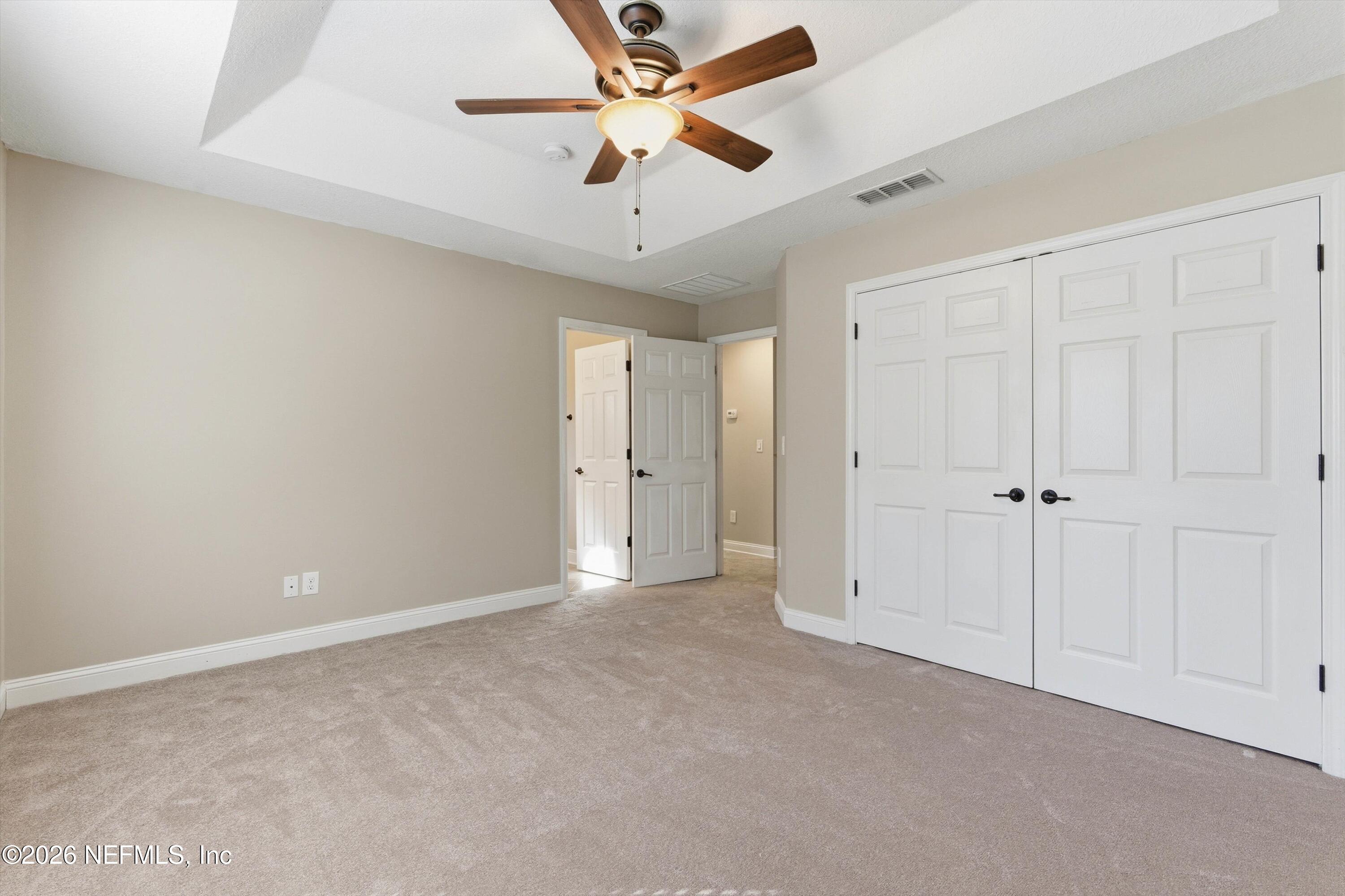 1733 Sanctuary Way Fleming Island, FL 32003 - Photo 23 of 39 a view of an empty room
