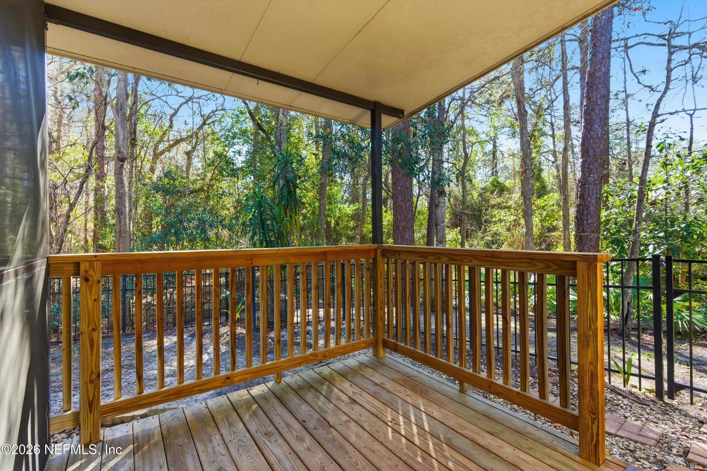 1733 Sanctuary Way Fleming Island, FL 32003 - Photo 33 of 39 a view of balcony with wooden floor