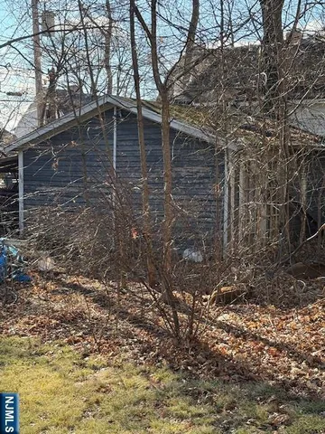 a view of a house with a street