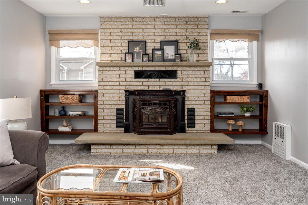 330 Londontown Road Edgewater, MD 21037 - Photo 11 of 61 a living room with furniture and a fireplace