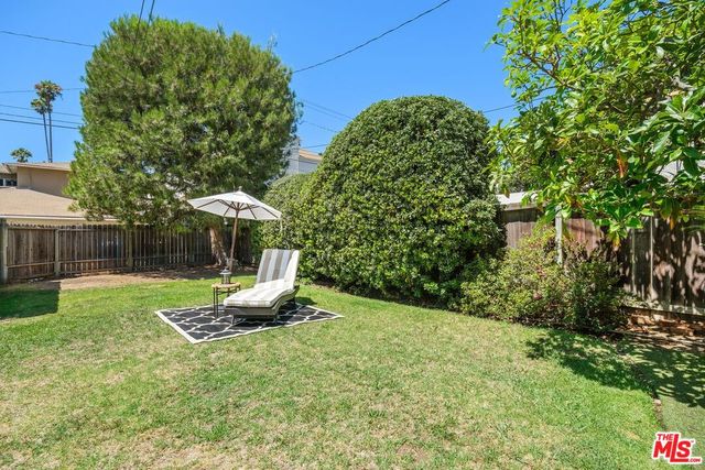 a garden view with a seating space