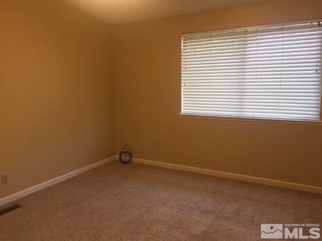 1336 Canyon Creek Road Reno, NV 89523 - Photo 13 of 32 an empty room with a window