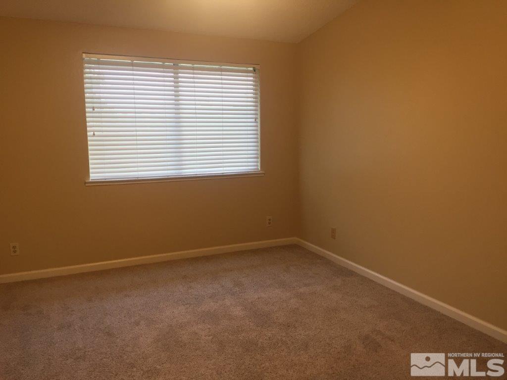 1336 Canyon Creek Road Reno, NV 89523 - Photo 14 of 32 an empty room with a window
