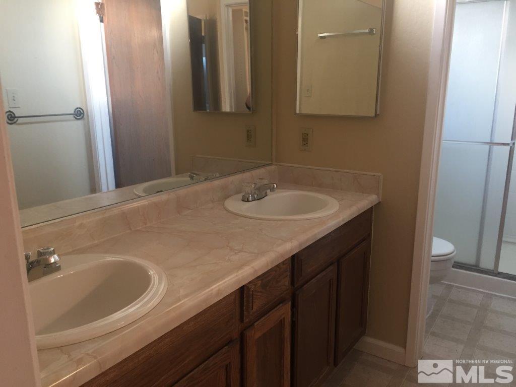 1336 Canyon Creek Road Reno, NV 89523 - Photo 15 of 32 a bathroom with a sink and a mirror
