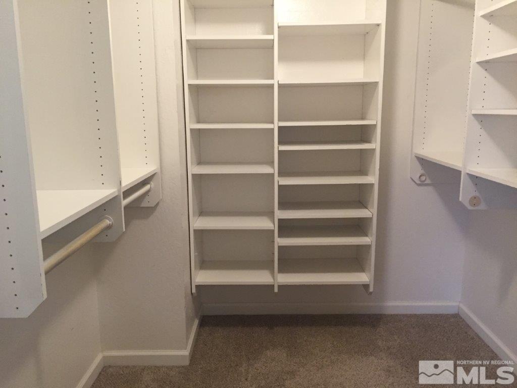 1336 Canyon Creek Road Reno, NV 89523 - Photo 17 of 32 a view of walk in closet with empty racks