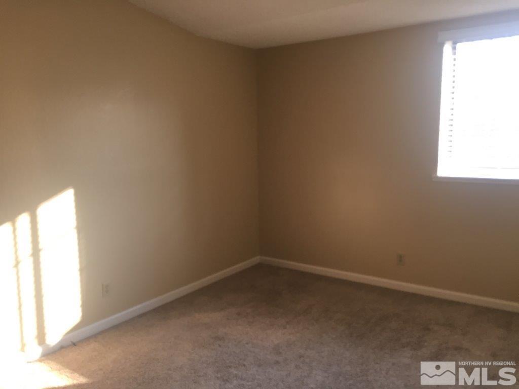 1336 Canyon Creek Road Reno, NV 89523 - Photo 18 of 32 an empty room with a window