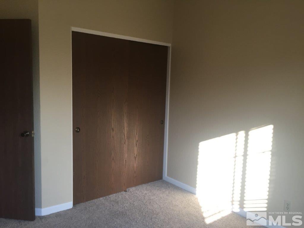 1336 Canyon Creek Road Reno, NV 89523 - Photo 19 of 32 a view of an empty room and window