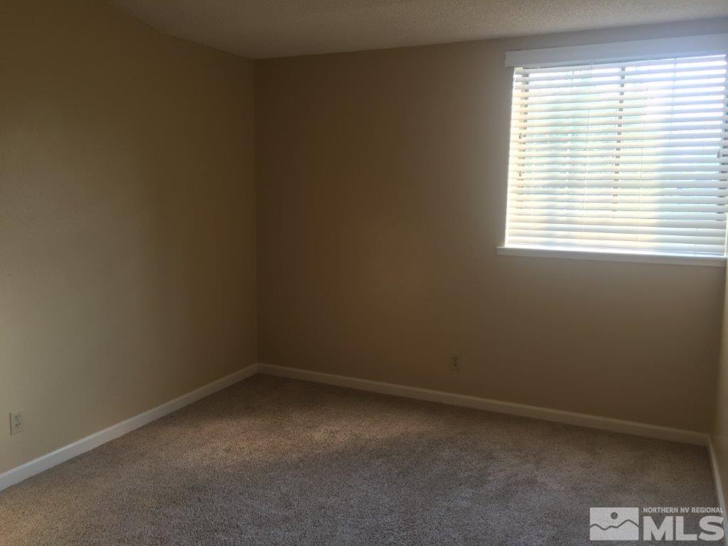1336 Canyon Creek Road Reno, NV 89523 - Photo 20 of 32 an empty room with a window