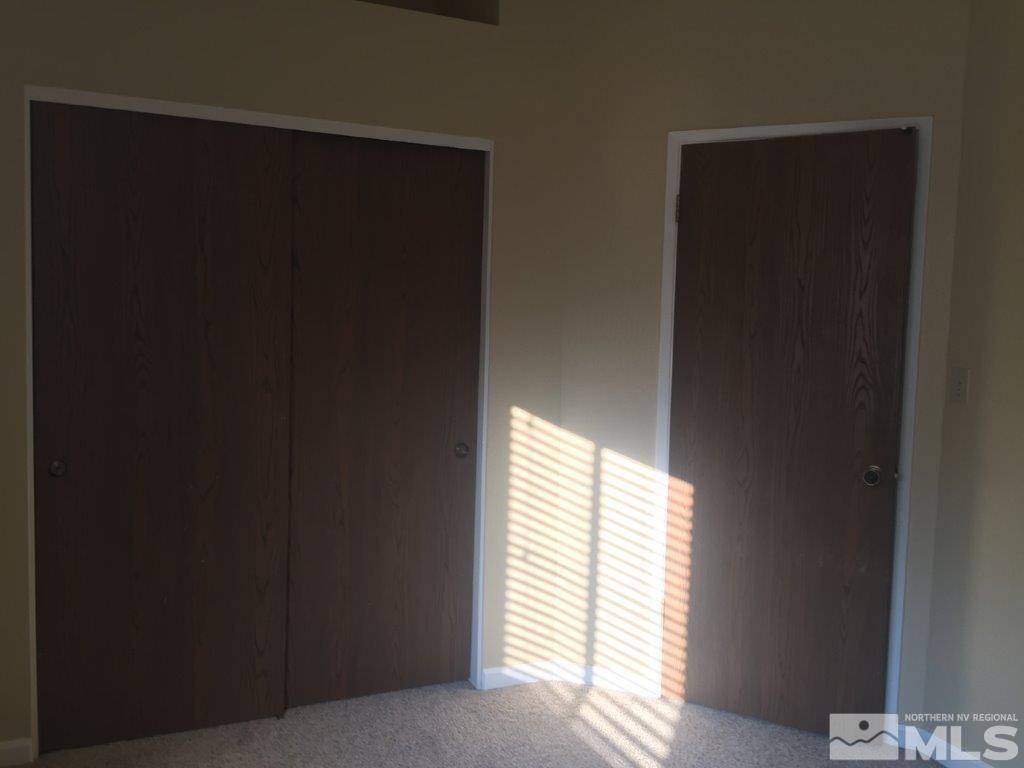 1336 Canyon Creek Road Reno, NV 89523 - Photo 21 of 32 a view of an empty room with a window