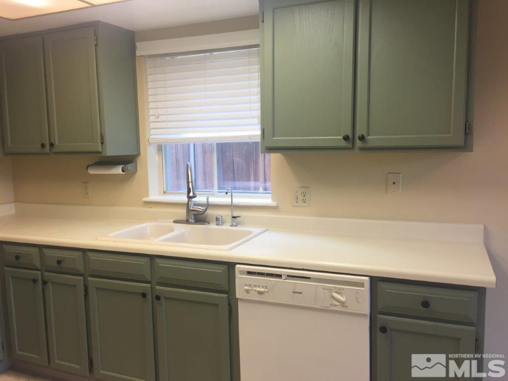 1336 Canyon Creek Road Reno, NV 89523 - Photo 6 of 32 a kitchen with a sink and cabinets