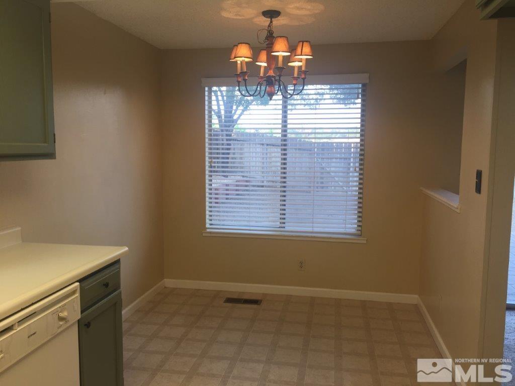 1336 Canyon Creek Road Reno, NV 89523 - Photo 7 of 32 a view of empty room with window