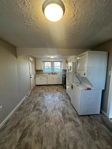 a view of kitchen and windows