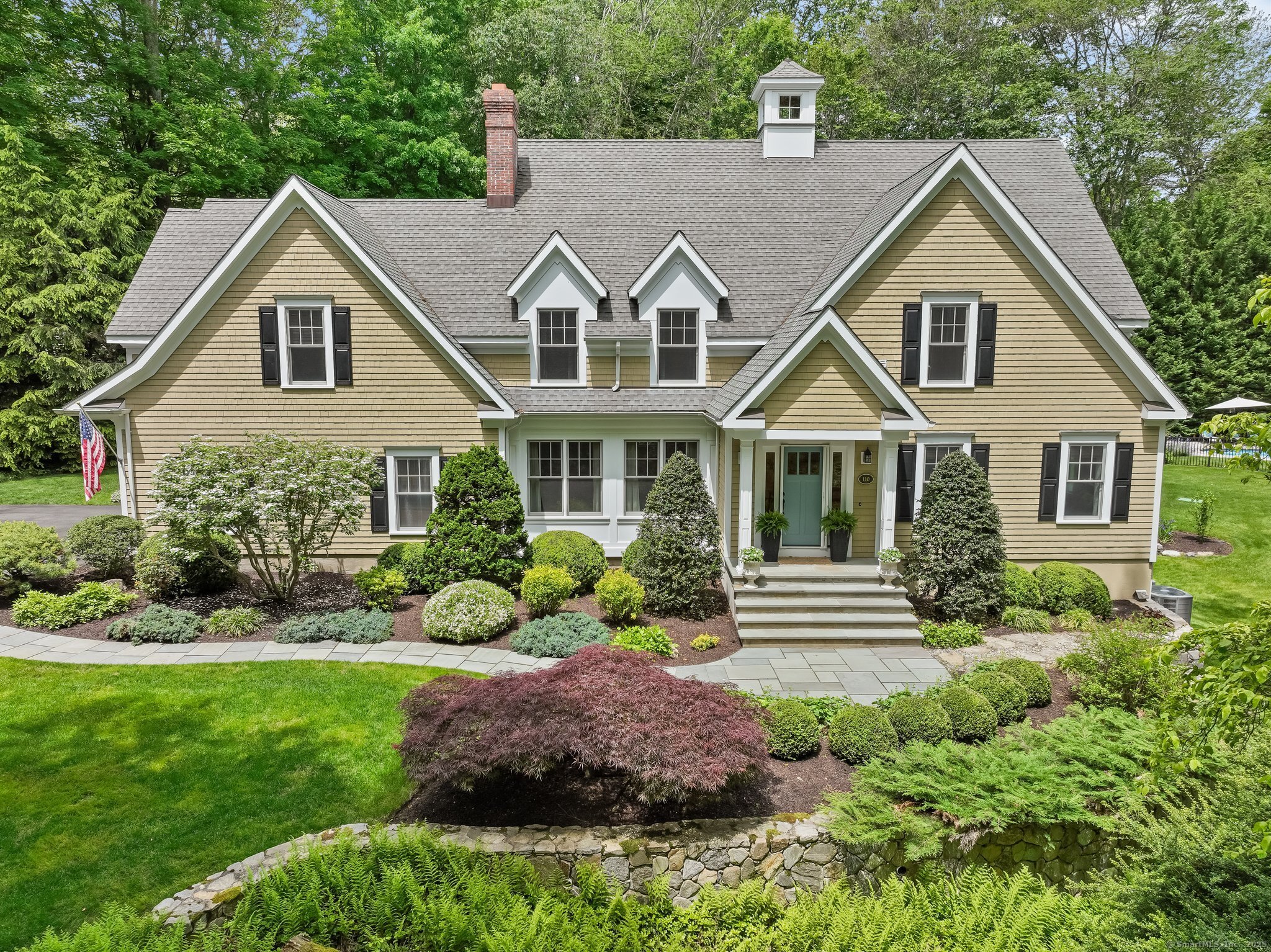 110 Florence Lane Fairfield, CT 06824 - Photo 1 of 1 a front view of a house with a yard