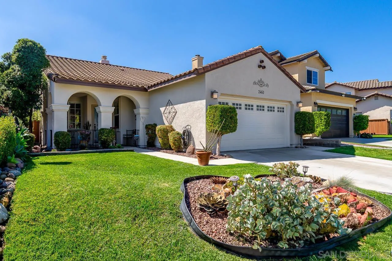 a view of a house with garden