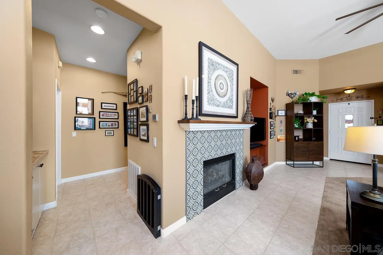 2460 Eagle Valley Drive Chula Vista, CA 91914 - Photo 14 of 35 a living room with furniture and a fireplace