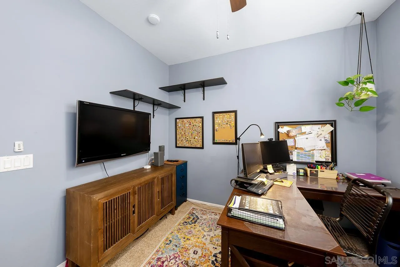 2460 Eagle Valley Drive Chula Vista, CA 91914 - Photo 22 of 35 a living room with furniture and a flat screen tv