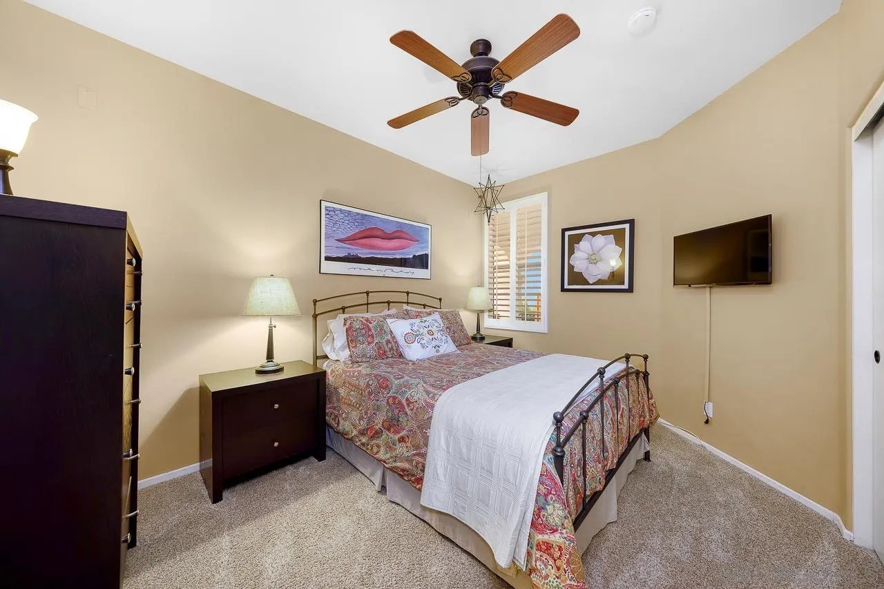 2460 Eagle Valley Drive Chula Vista, CA 91914 - Photo 25 of 35 a bedroom with a bed and a flat screen tv