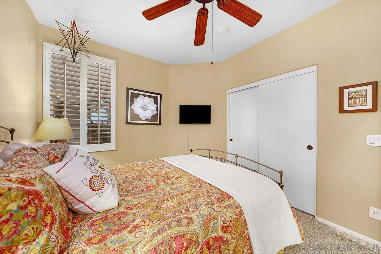 2460 Eagle Valley Drive Chula Vista, CA 91914 - Photo 26 of 35 a bedroom with a bed and wooden floor