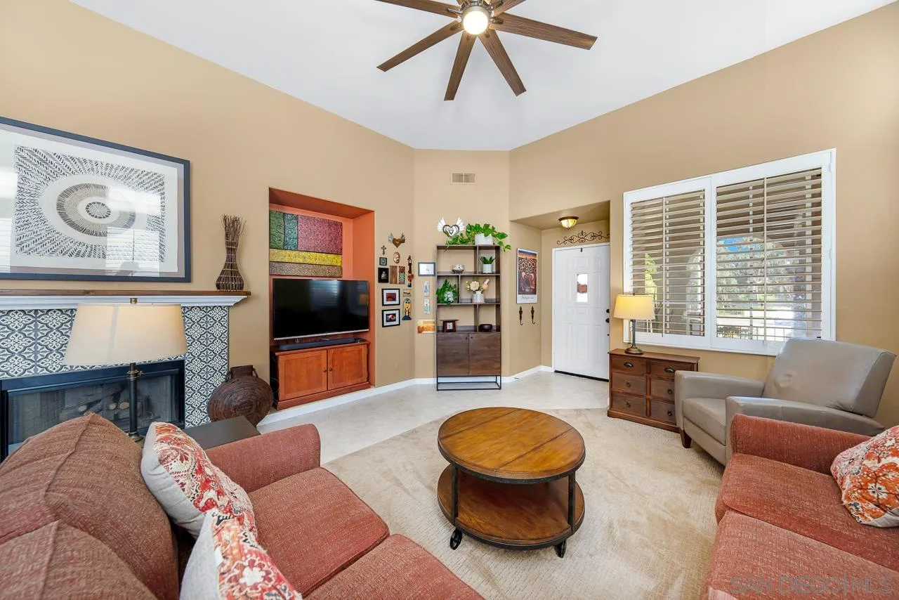 2460 Eagle Valley Drive Chula Vista, CA 91914 - Photo 4 of 35 a living room with furniture and a flat screen tv