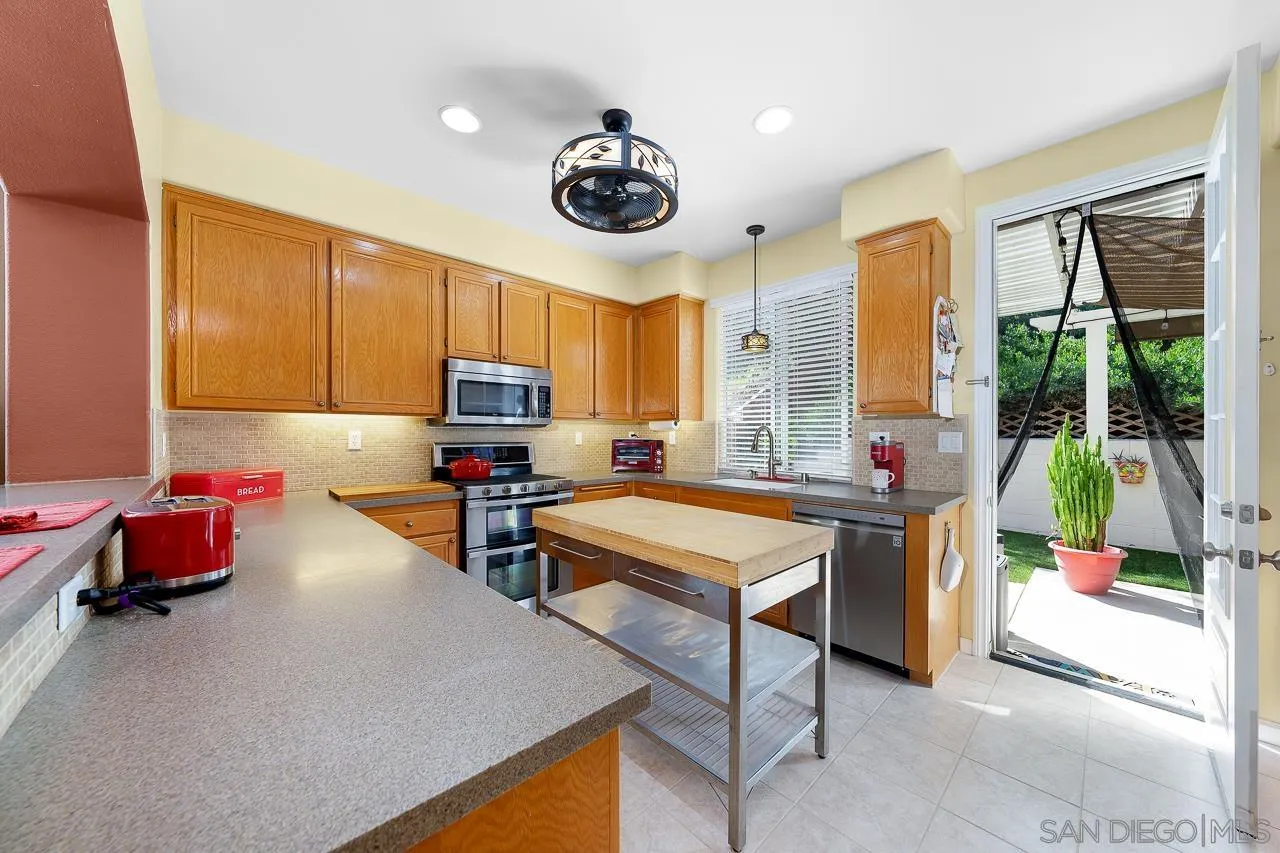 2460 Eagle Valley Drive Chula Vista, CA 91914 - Photo 9 of 35 a living room with furniture and a large window