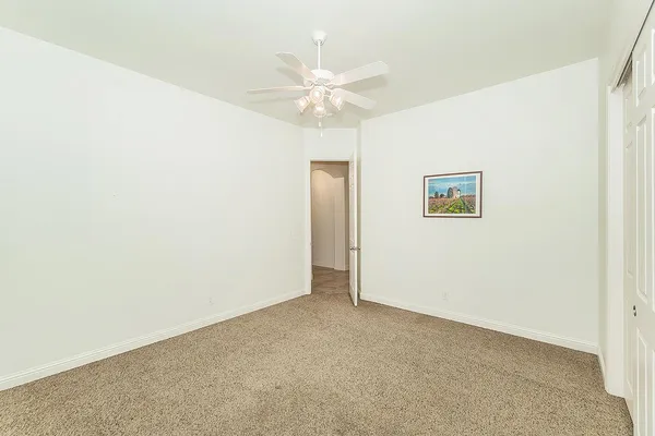 a view of a golf course with a big yard