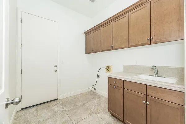 a view of a house with a yard and garden