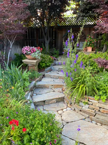 a view of a house with fountain bath tub and trees