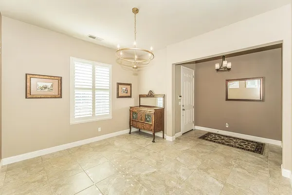 a bathroom with a tub sink and a mirror