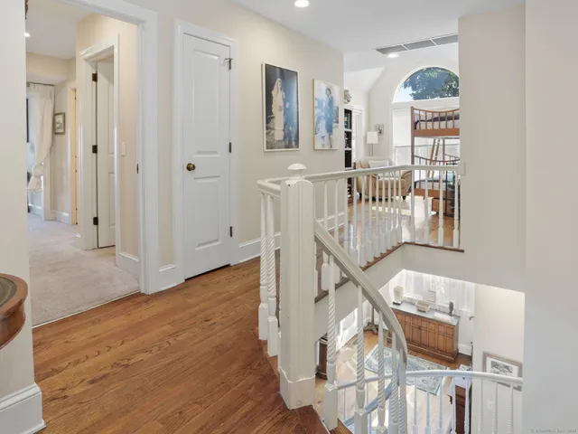 a view of entryway with wooden floor