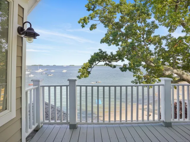a view of a porch with wooden floor