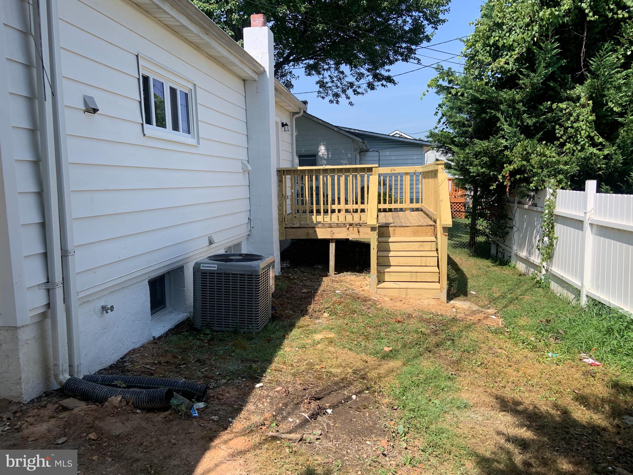 717 Fuselage Avenue Middle River, MD 21221 - Photo 22 of 31 a front view of a house with a yard