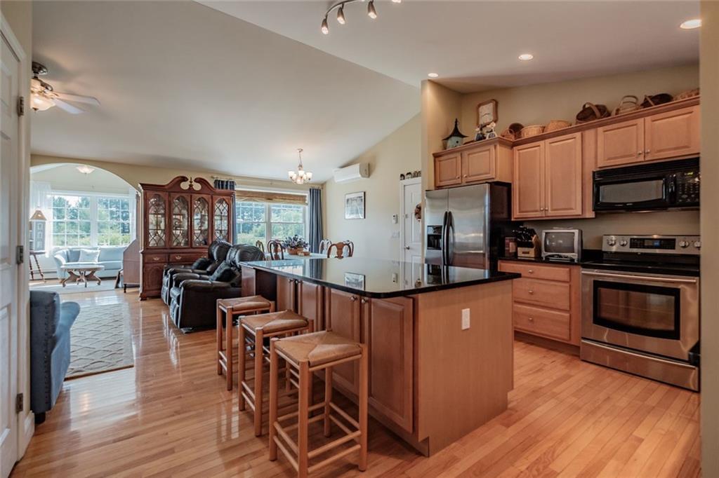 56 New County Road Saco, ME 04072 - Photo 5 of 34 Vaulted kitchen, Maple cabinets,...