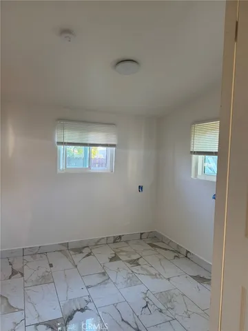 a view of a room with a window