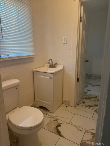 a bathroom with a sink and a toilet