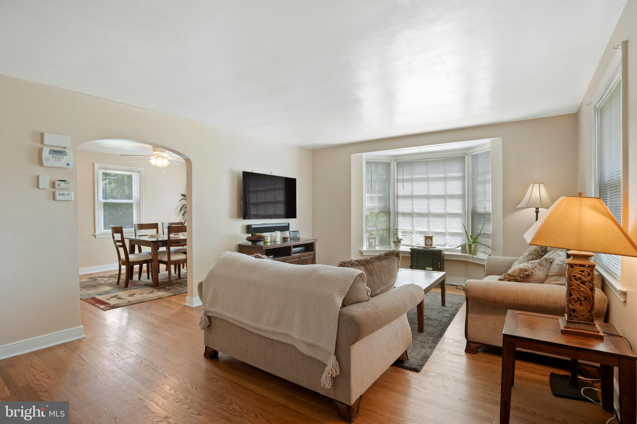 15 Dewey Road Cheltenham, PA 19012 - Photo 3 of 28 Living room with hardwoods and fantastic light