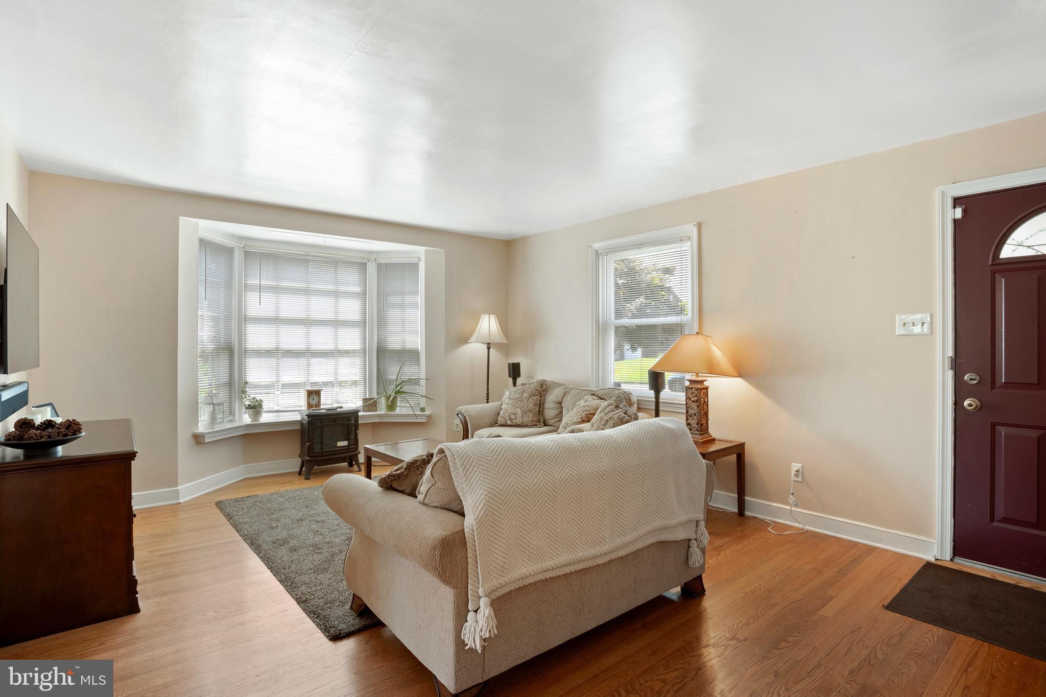 15 Dewey Road Cheltenham, PA 19012 - Photo 4 of 28 Living room with hardwoods and fantastic light