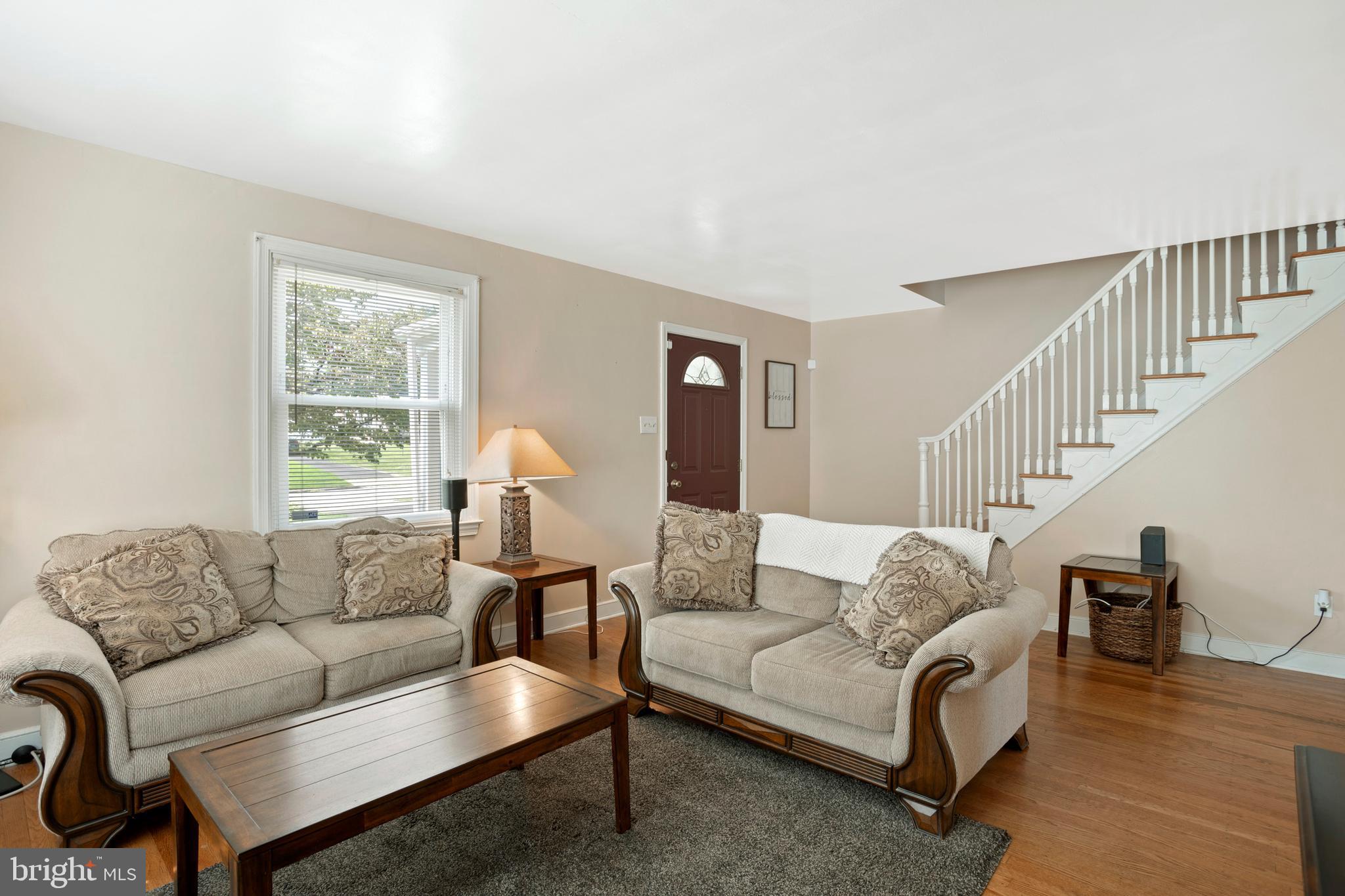 15 Dewey Road Cheltenham, PA 19012 - Photo 5 of 28 Living room with hardwoods and fantastic light