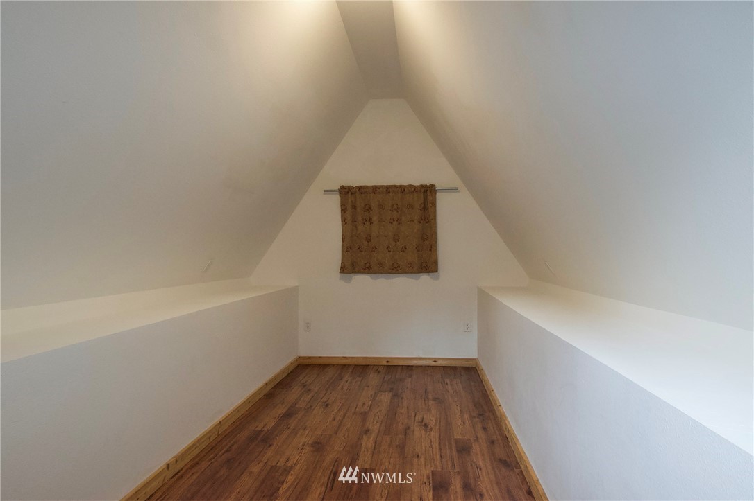 463 Autumn Road Sequim, WA 98382 - Photo 22 of 40 a view of hallway with wooden floor