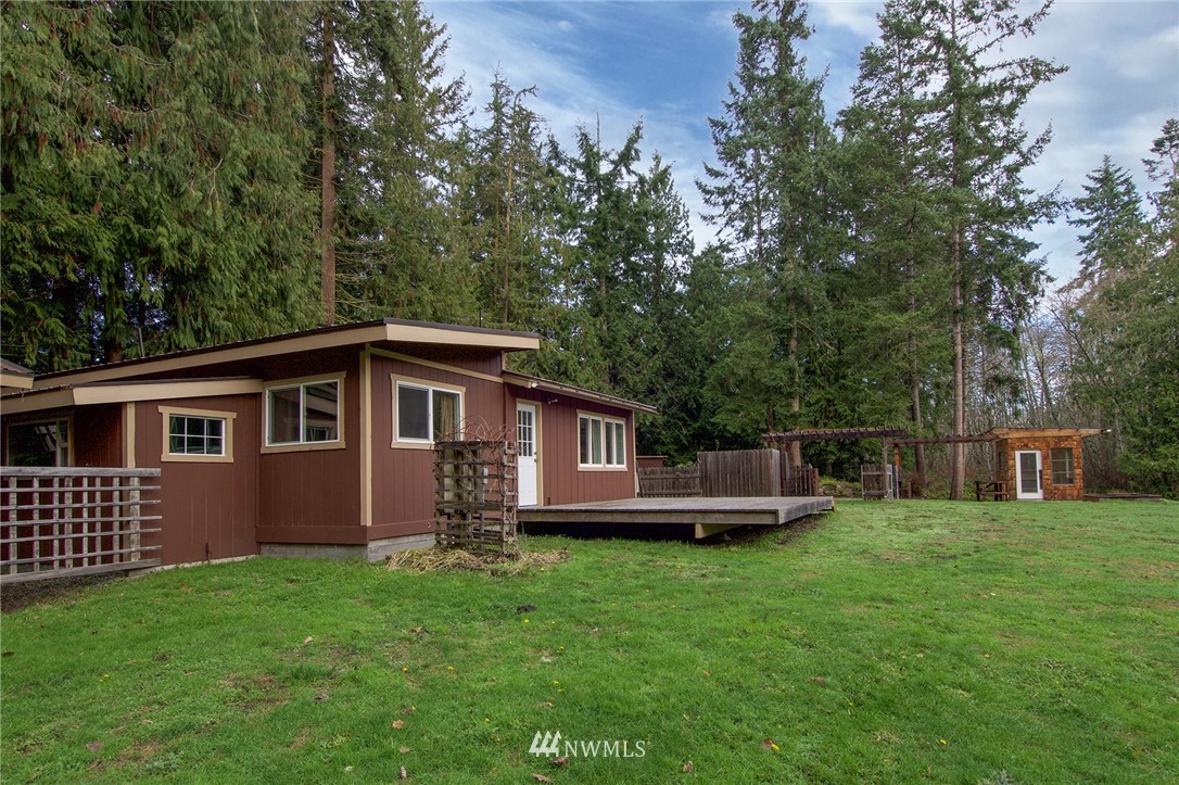 463 Autumn Road Sequim, WA 98382 - Photo 25 of 40 a front view of a house with a garden