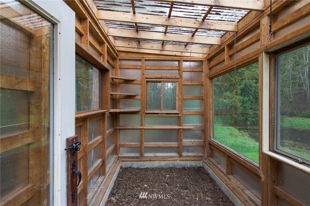 463 Autumn Road Sequim, WA 98382 - Photo 28 of 40 a front view of a house with a large window