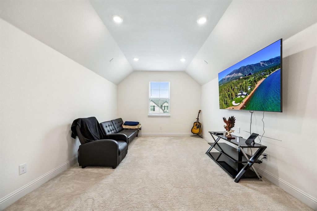 11732 Wulstone Road Fort Worth, TX 76052 - Photo 13 of 34 Carpeted room featuring a single window, recessed lighting, and sloped ceilings